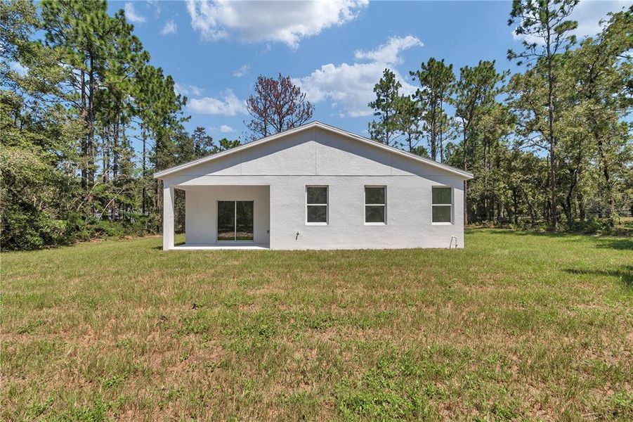 Front exterior of a new home in , Ocala, FL, highlighting curb appeal (Image 34).