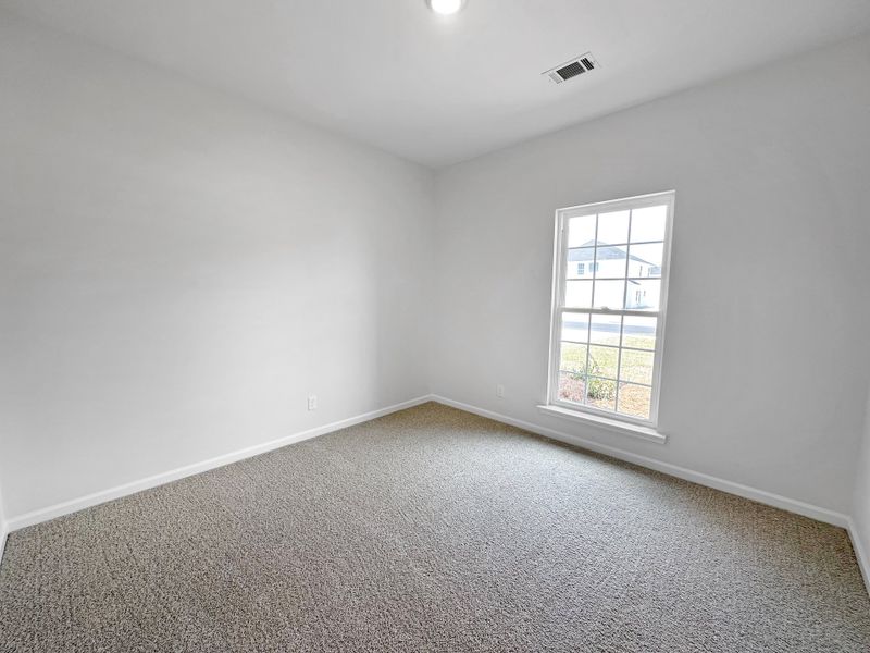 Spacious, unfurnished interior of a new home in Doctor's Creek, Ludowici (Image 18).