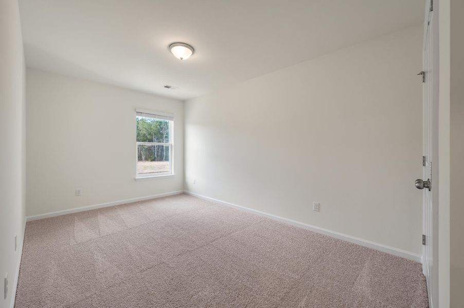 Spacious, unfurnished interior of a new home in The Landings at Montague, Goose Creek (Image 34).