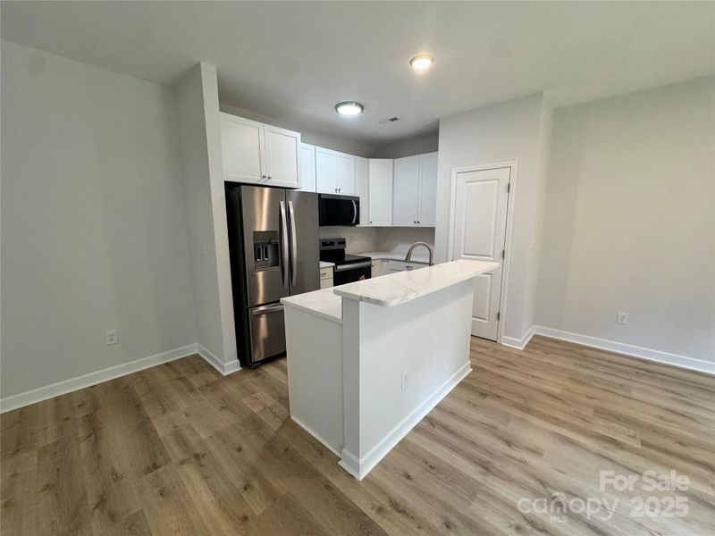 Furnished interior view inside a new home in , Lowell (Image 7).