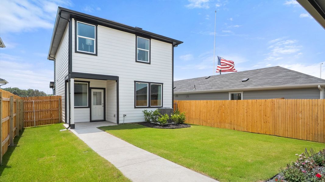 Representative exterior photo of a completed home built from the The Madeline by D.R. Horton in Valverde, Bastrop, TX (Image 21). Representative exterior photo of a completed home built from the The Madeline by D.R. Horton in Valverde, Bastrop, TX (Image 21).