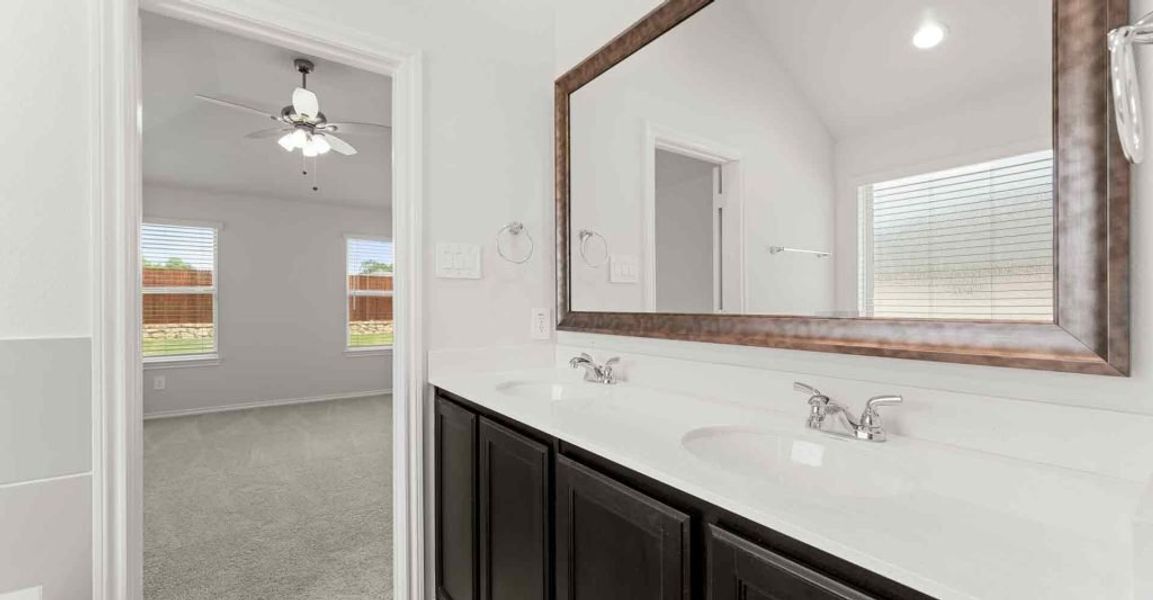 Representative exterior photo of a completed home built from the Atlanta by Impression Homes in Keeneland, Aubrey, TX (Image 17).