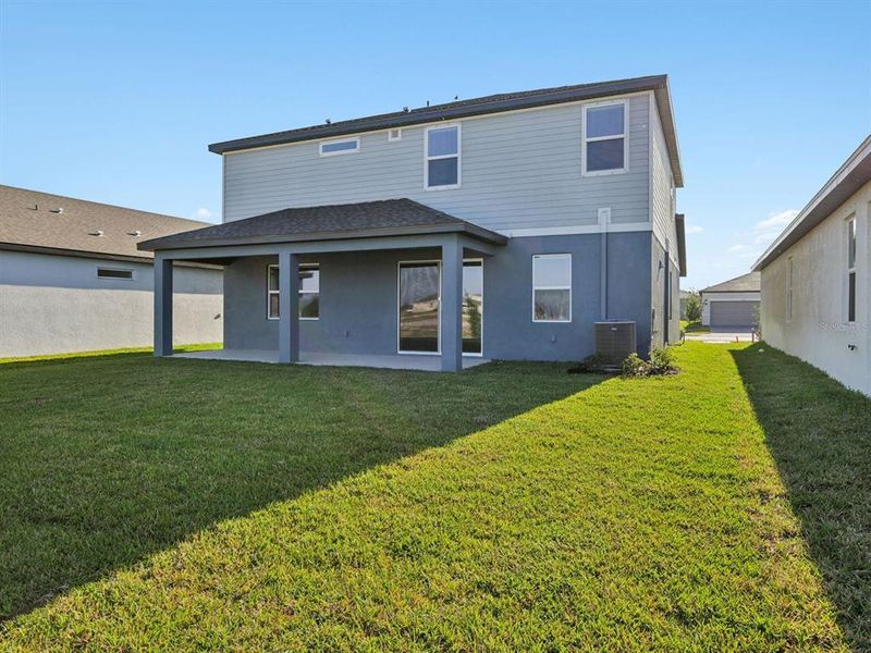 Exterior details and patio area of a home in Coasterra - Reserve Series, Palmetto (Image 24).