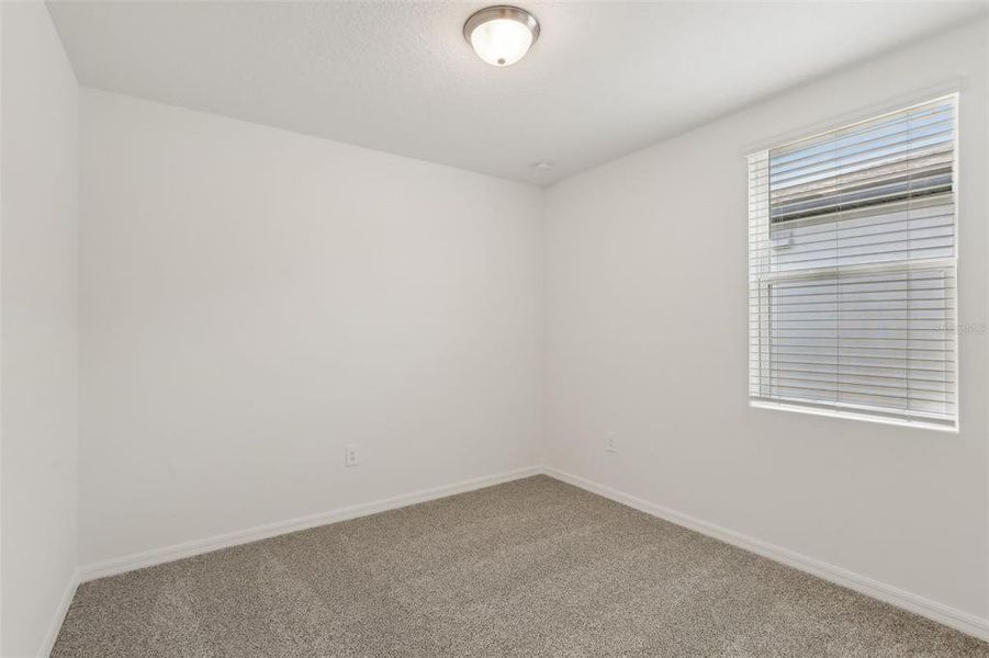 Spacious, unfurnished interior of a new home in Eden Hills, Lake Alfred (Image 25).