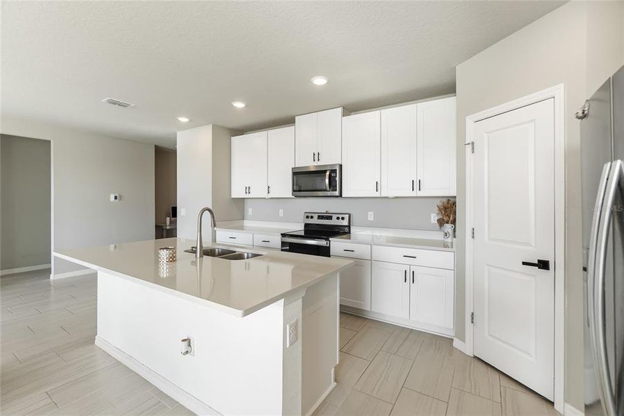 Furnished interior view inside a new home in Salt Meadows - Classic Series, Parrish (Image 15).