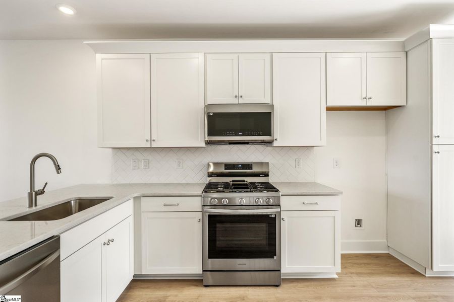 Furnished interior view inside a new home in Renaissance Place, Greenville (Image 7).