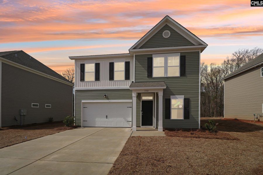 Front exterior of a new home in Raglins Creek, Lugoff, SC, highlighting curb appeal (Image 1).