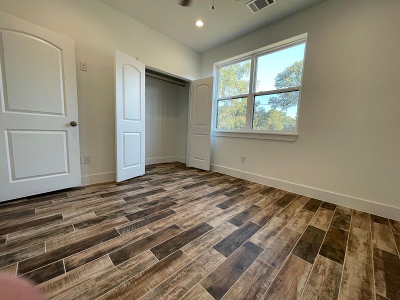 Bedroom 2, each room is geared for tv