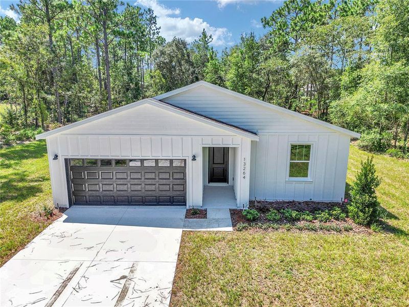 Front exterior of a new home in , Ocala, FL, highlighting curb appeal (Image 23).