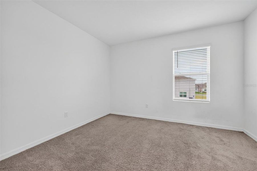 Spacious, unfurnished interior of a new home in Farm at Varrea, Plant City (Image 28).