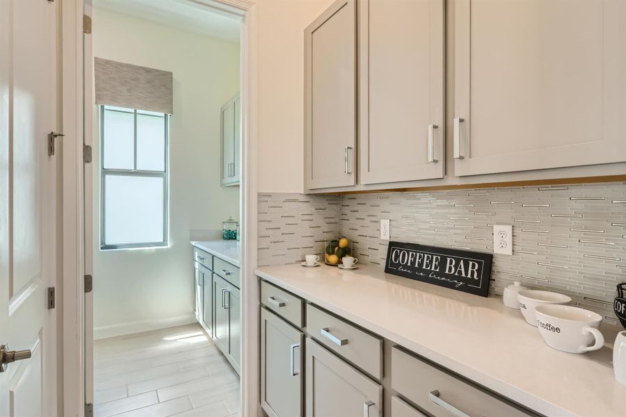Furnished interior view inside a new home in Tesoro Club, Port St. Lucie (Image 7).