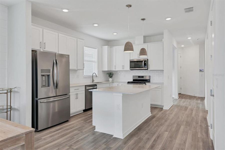 All appliances and pendants convey with the home