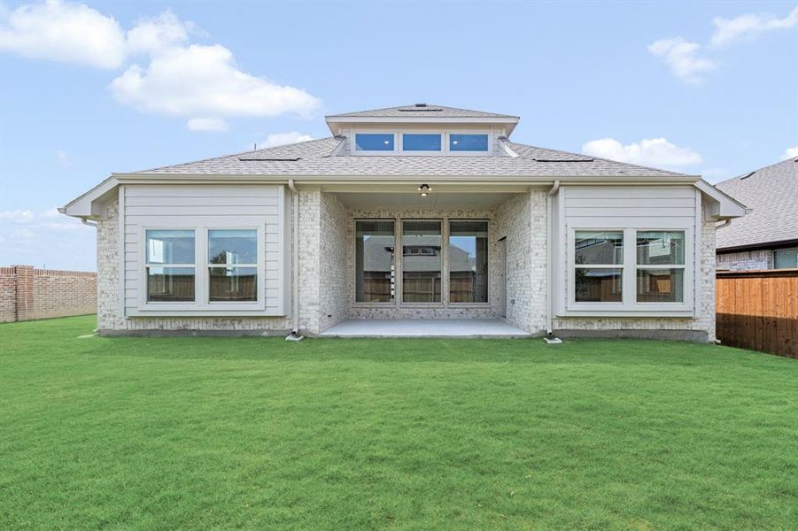 Exterior details and patio area of a home in Creekview Meadows, Pilot Point (Image 4). Exterior details and patio area of a home in Creekview Meadows, Pilot Point (Image 4).