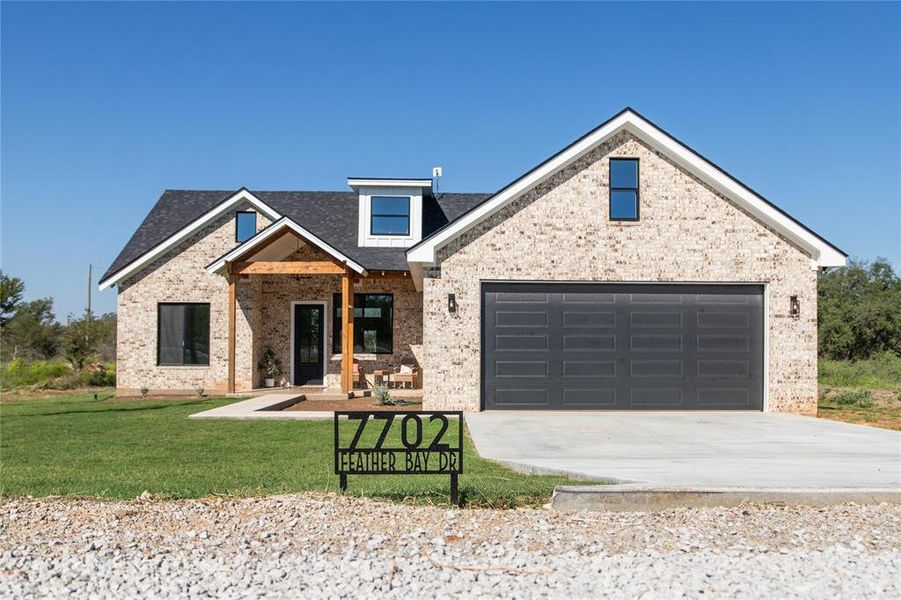 Front exterior of a new home in , Brownwood, TX, highlighting curb appeal (Image 20).