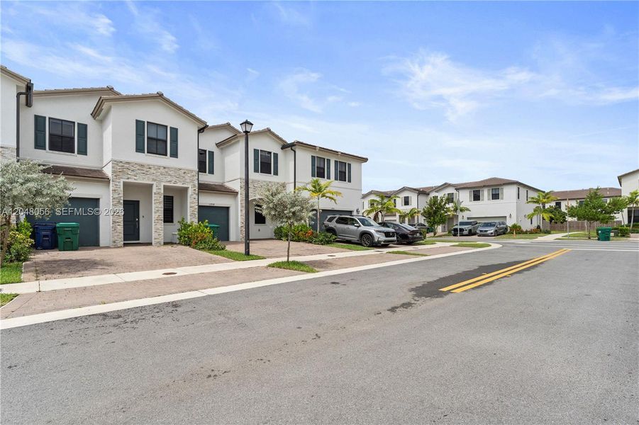 Front exterior of a new home in , Miami, FL, highlighting curb appeal (Image 23). Front exterior of a new home in , Miami, FL, highlighting curb appeal (Image 23).