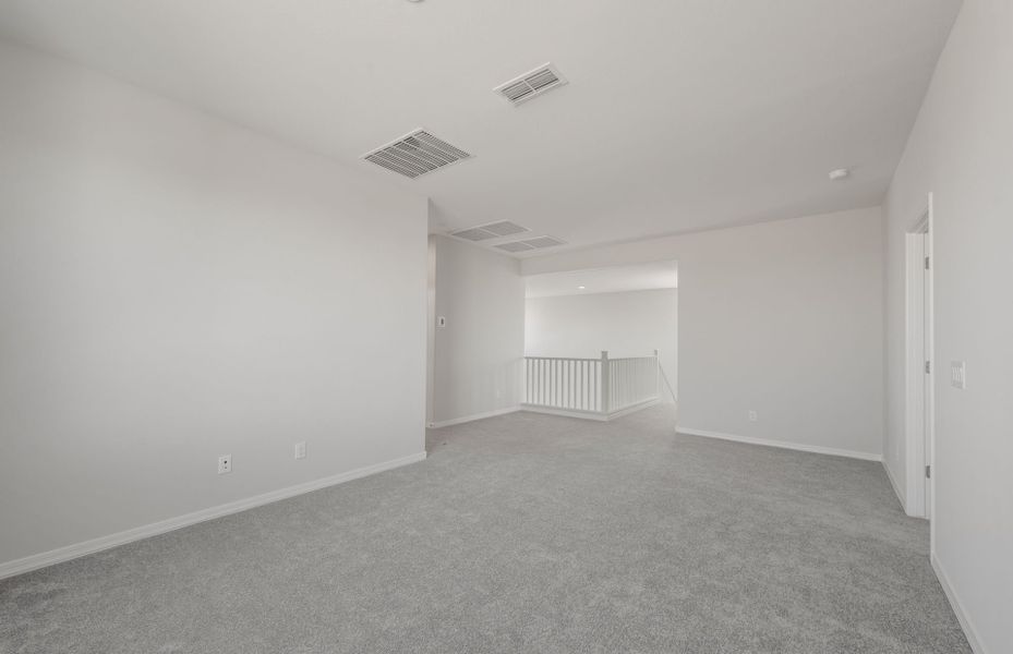 Spacious, unfurnished interior of a new home in Artisan at Asante, Surprise (Image 27).