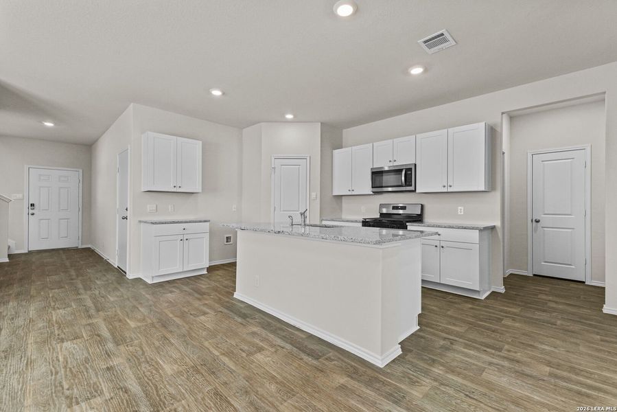 Furnished interior view inside a new home in Hunters Ranch, San Antonio (Image 6).
