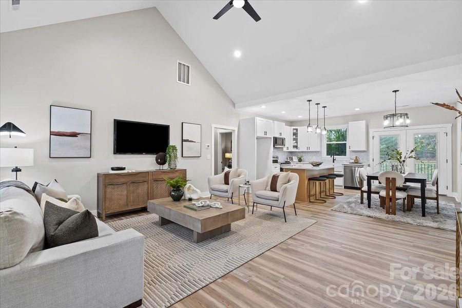 Photo of nearly identical home so you can see the space with furniture.