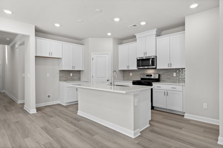 Furnished interior view inside a new home in Waterside - Boardwalk Series, Longs (Image 4). Furnished interior view inside a new home in Waterside - Boardwalk Series, Longs (Image 4).