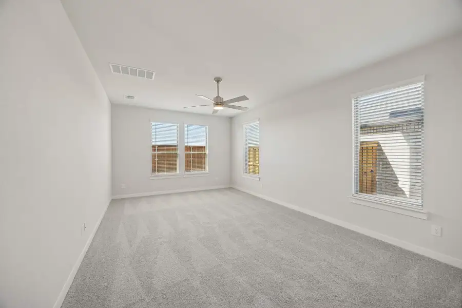 Primary Suite in the Wimbledon home plan by Trophy Signature Homes – REPRESENTATIVE PHOTO Primary Suite in the Wimbledon home plan by Trophy Signature Homes – REPRESENTATIVE PHOTO
