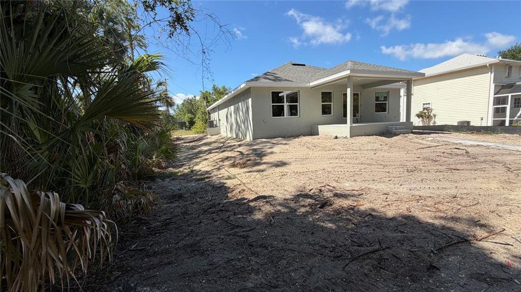 Exterior details and patio area of a home in Port Charlotte, Port Charlotte (Image 3).