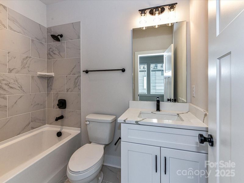 Furnished interior view inside a new home in North End Terraces, Charlotte (Image 6).