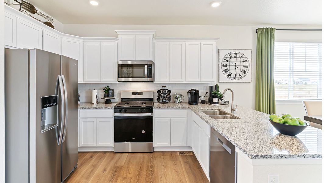 Furnished interior view inside a new home in Sky Ranch, Watkins (Image 8).