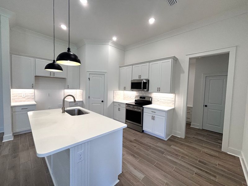 Furnished interior view inside a new home in Bird Song at Hammock Bay, Freeport (Image 9).