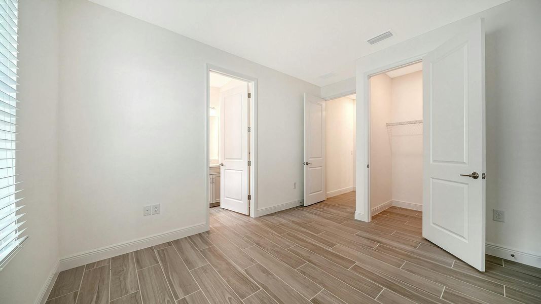 Spacious, unfurnished interior of a new home in Windward Real Estate and Homes for Sale in Sarasota, FL - Neal Communities, Lakewood Ranch (Image 46).