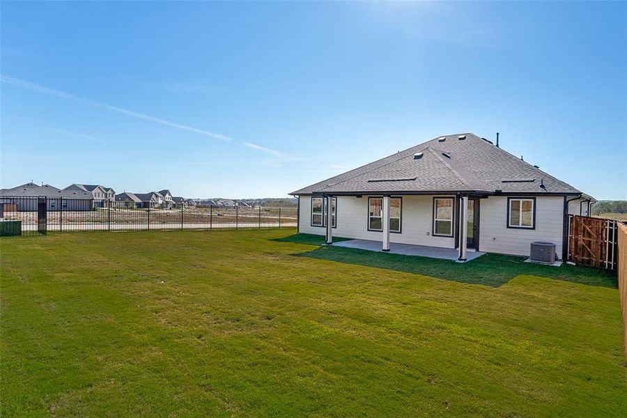 Exterior details and patio area of a home in Sierra Vista at Kelly Ranch, Aledo (Image 2).