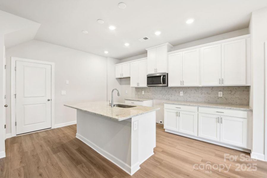 Furnished interior view inside a new home in Buffalo Ridge, Newton (Image 4).