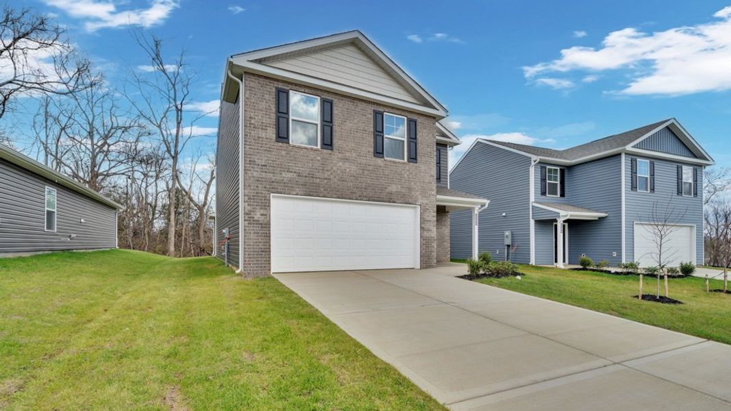 Front exterior of a new home in Johnson Farms, Greeneville, TN, highlighting curb appeal (Image 15). Front exterior of a new home in Johnson Farms, Greeneville, TN, highlighting curb appeal (Image 15).