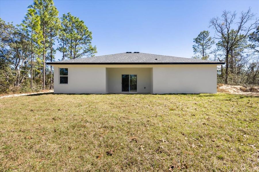 Exterior details and patio area of a home in , Citrus Springs (Image 20).