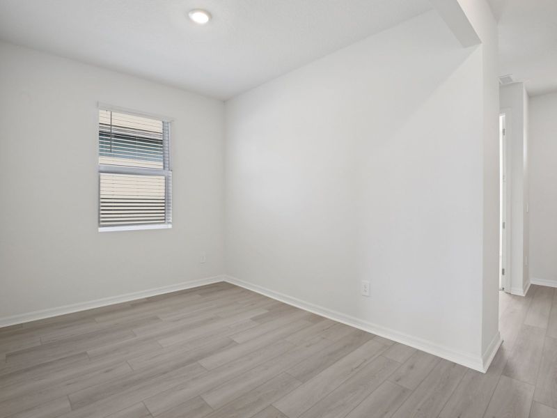 Spacious, unfurnished interior of a new home in Coasterra - Reserve Series, Palmetto (Image 11).