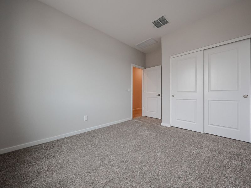 A room with white doors.