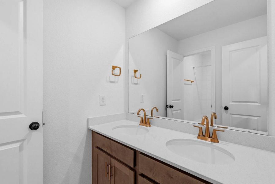 Secondary bathroom. Sample product photo. Actual exterior and interior selections may vary by homesite. Photo may be virtually staged. Secondary bathroom. Sample product photo. Actual exterior and interior selections may vary by homesite. Photo may be virtually staged.