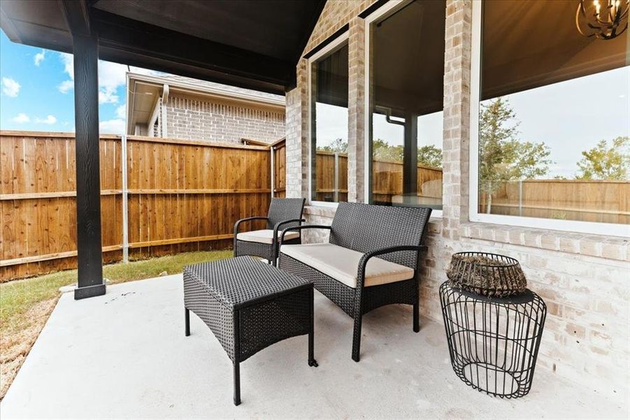 Exterior details and patio area of a home in Walden Pond West, Forney (Image 3).