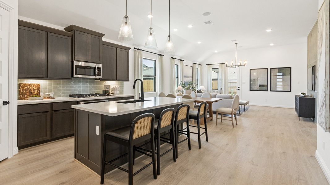 Representative furnished interior of a home built from the Oleander by Brightland Homes in Sunterra, Katy (Image 4).