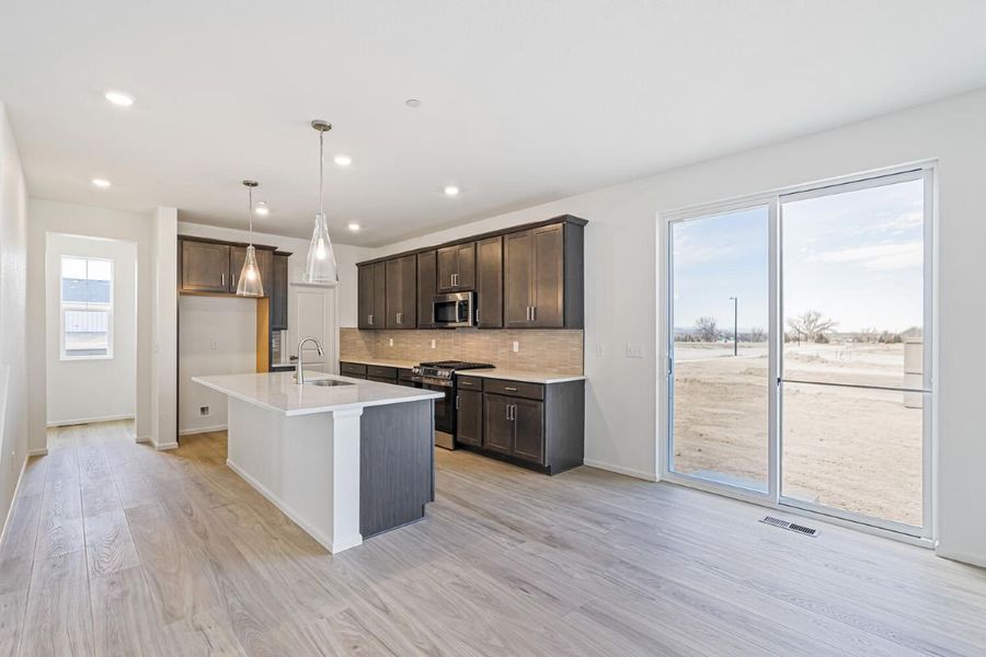 Furnished interior view inside a new home in The Nest Reserve at Canyon Creek, Erie (Image 6).