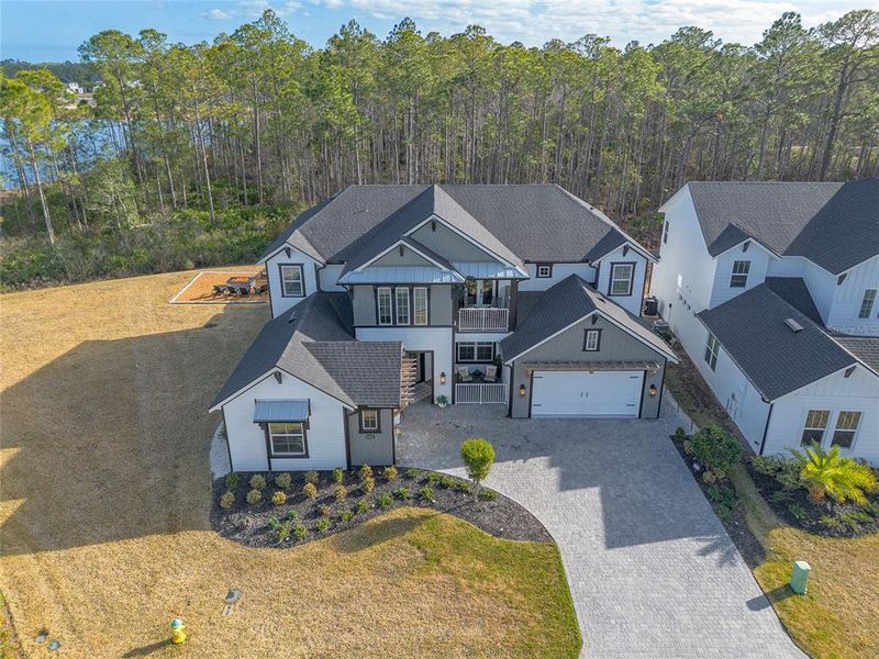 Front exterior of a new home in , Port Orange, FL, highlighting curb appeal (Image 27).