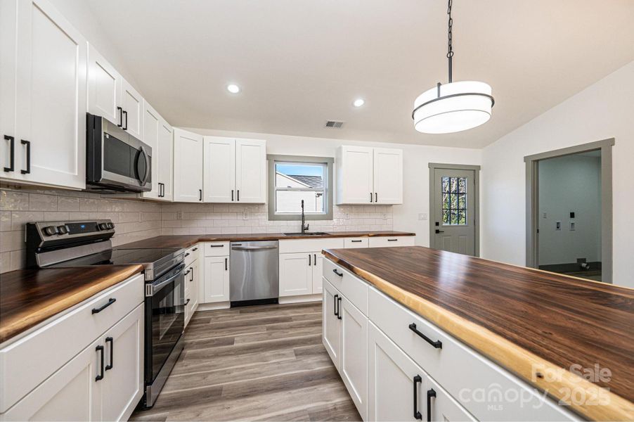 Furnished interior view inside a new home in , Valdese (Image 8).