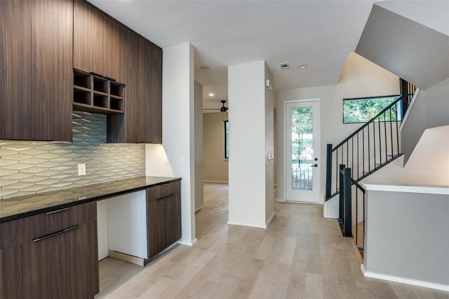 Photos are of unit #204. Unit #101 will feature white cabinets and grey wood floors. Photos are of unit #204. Unit #101 will feature white cabinets and grey wood floors.