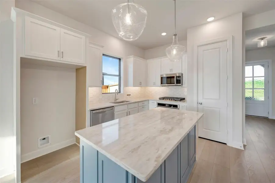 Furnished interior view inside a new home in Sienna - Landmark Row Collection, Missouri City (Image 7).