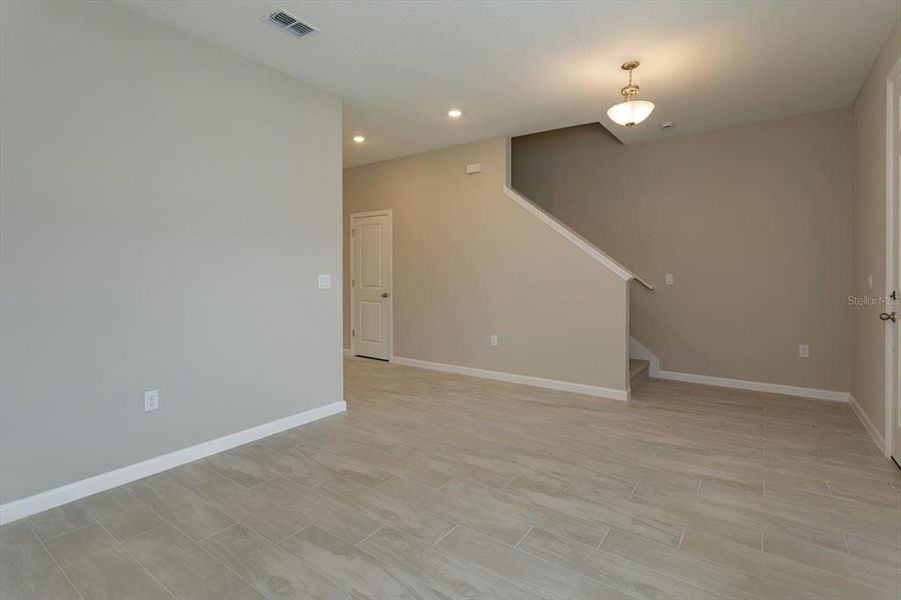 Spacious, unfurnished interior of a new home in Serenade at Ovation, Winter Garden (Image 24).