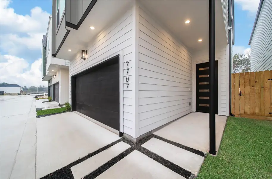 Exterior details and patio area of a home in , Houston (Image 3).