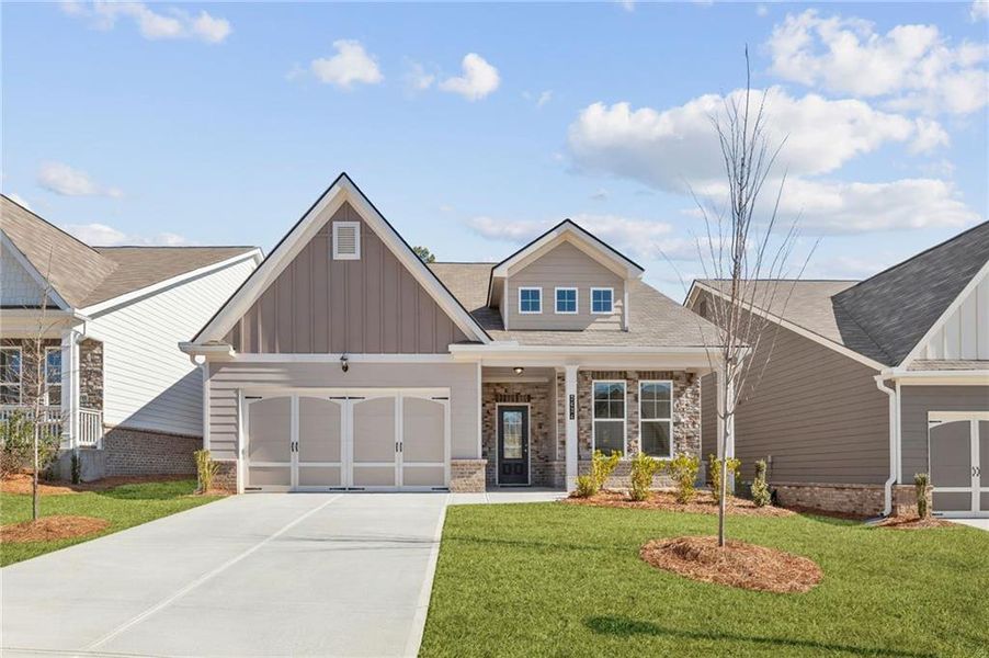 Front exterior of a new home in Cooper's Walk, Loganville, GA, highlighting curb appeal (Image 11).