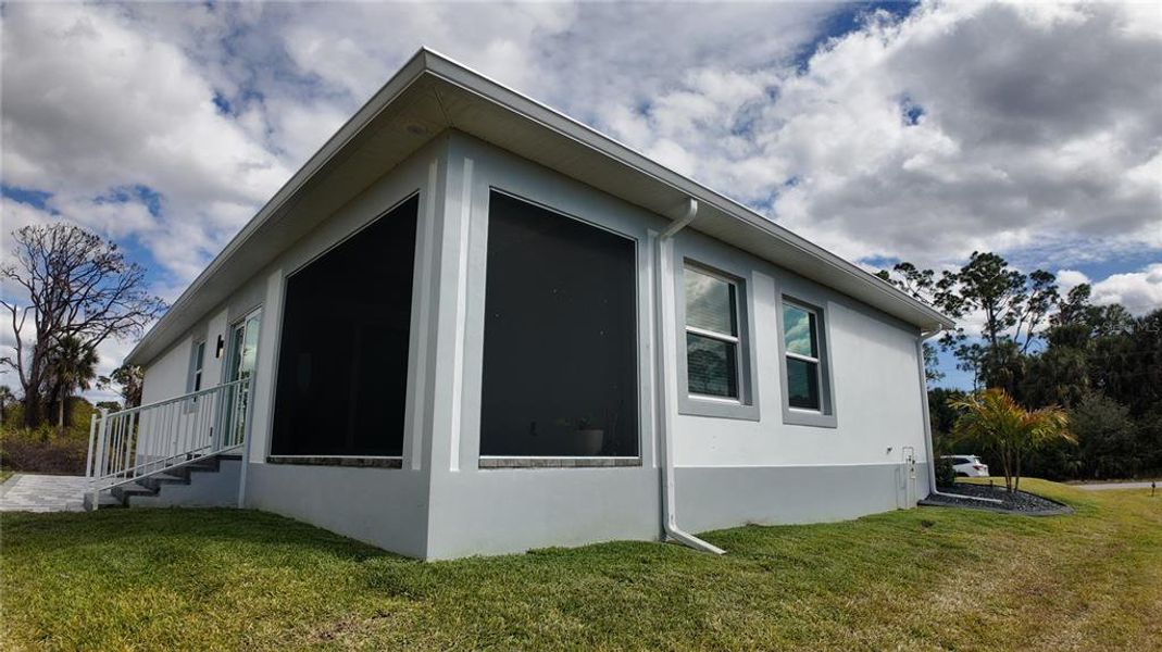 Exterior details and patio area of a home in , Port Charlotte (Image 27).