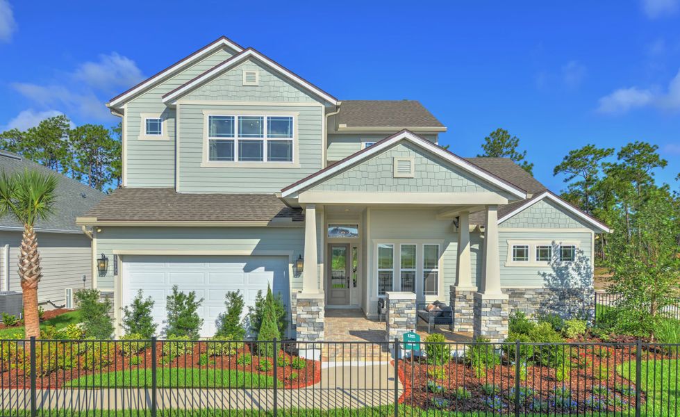 Front exterior of a new home in Seven Pines, Jacksonville, FL, highlighting curb appeal (Image 1).