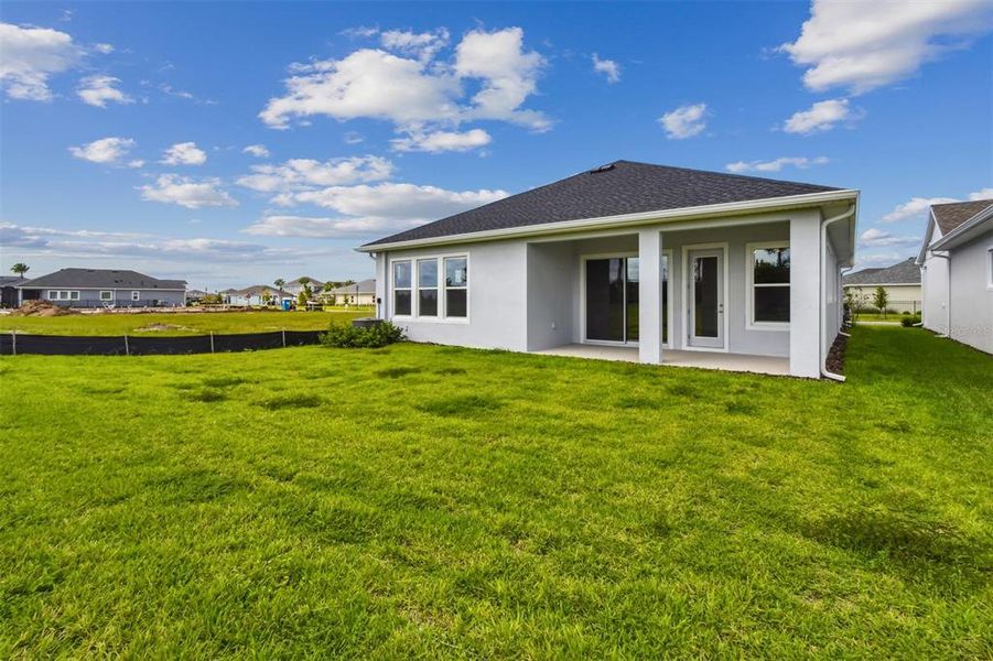 Exterior details and patio area of a home in Waterset Classic Series, Apollo Beach (Image 23).
