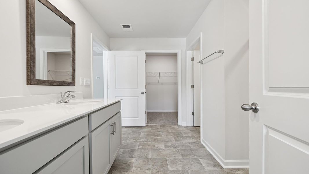 Furnished interior view inside a new home in Lakestone, Woodruff (Image 10).